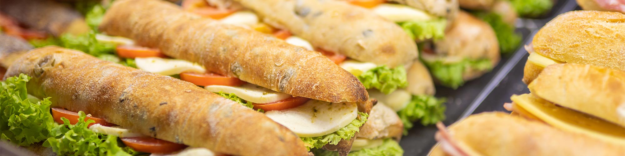 Catered Ham, Turkey, Cheese, & Italian Sub Sandwiches